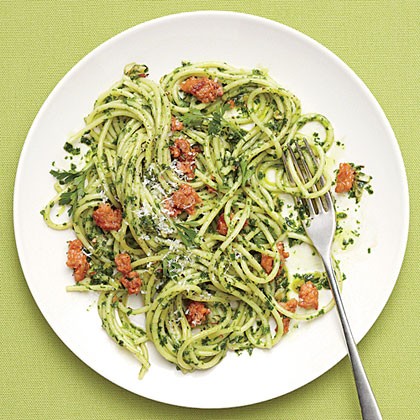 Spaghetti with parsley pesto and sausage