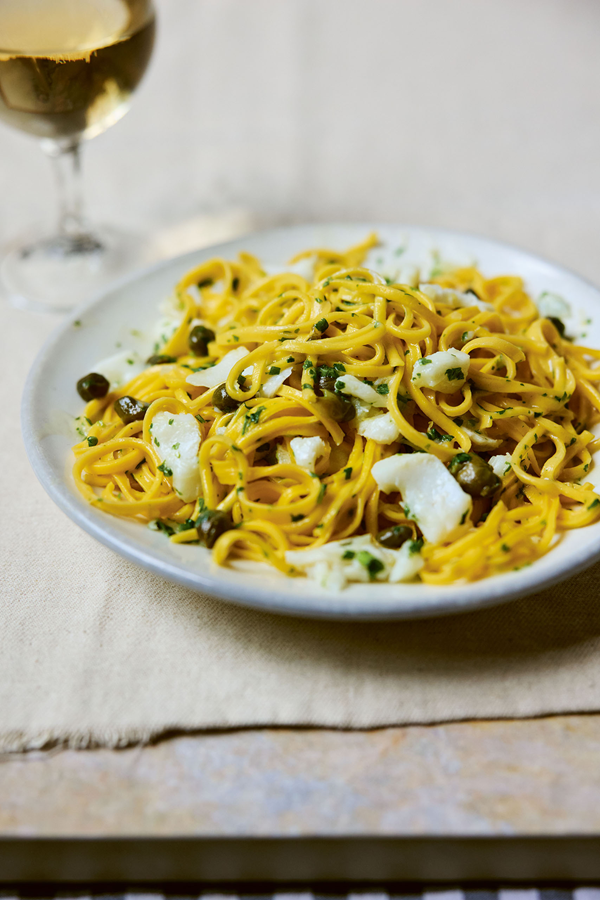 Spaghetti with poached cod, capers and lemon