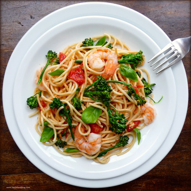 Spaghetti with shrimp, broccolini and basil