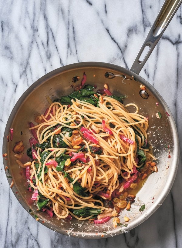 Spaghetti with swiss chard, pine nuts, raisins, and chiles