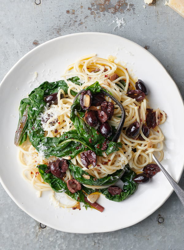 Spaghetti with wilted greens, lemon and Parmesan