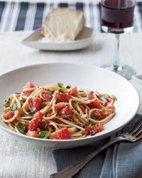 Spaghettini with tomatoes, anchovies and almonds