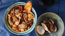 Spanish clams with white beans and chorizo in cider broth