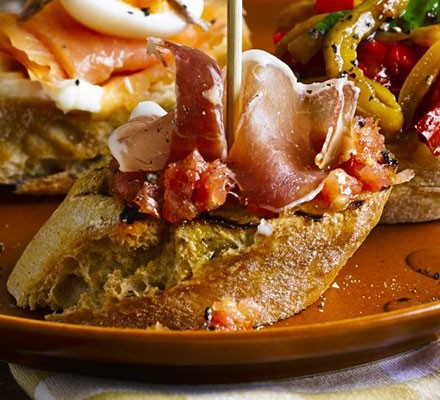 Spanish ham with crusty bread & chopped tomato 