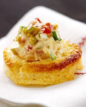 Spanish olive and cream cheese canapés