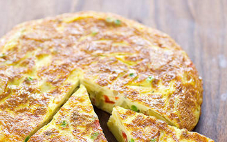 Spanish tortilla with roasted red peppers and peas