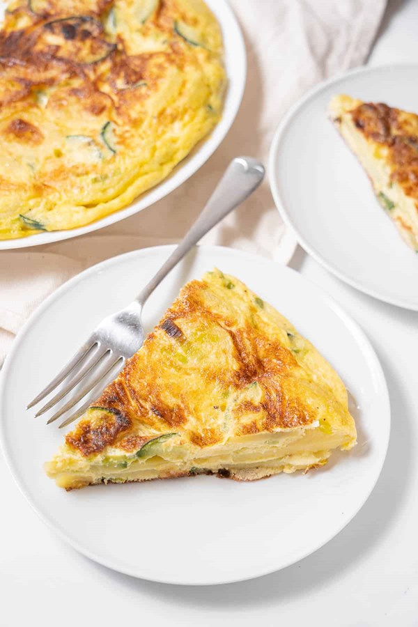 Spanish tortilla with zucchini, leeks, and cheese