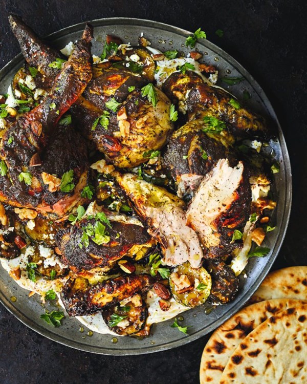 Spatchcock chicken ‘joojeh’ with dates, charred courgettes and labneh