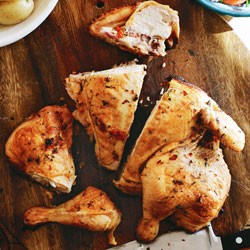Spatchcocked barbecued chicken with preserved lemon butter