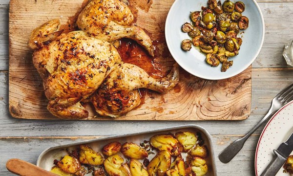 Spatchcocked lemon chicken with roasted green olives, thyme and potatoes