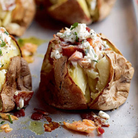 Speedy jacket potatoes with crispy bacon and salmon