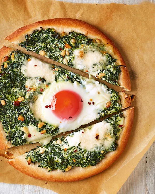 Speedy spinach, ricotta and egg pizzas 