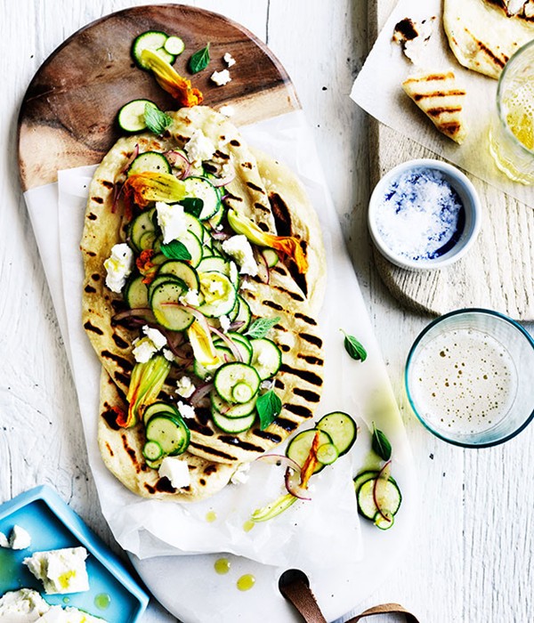 Speedy yoghurt flatbread with zucchini flowers and feta