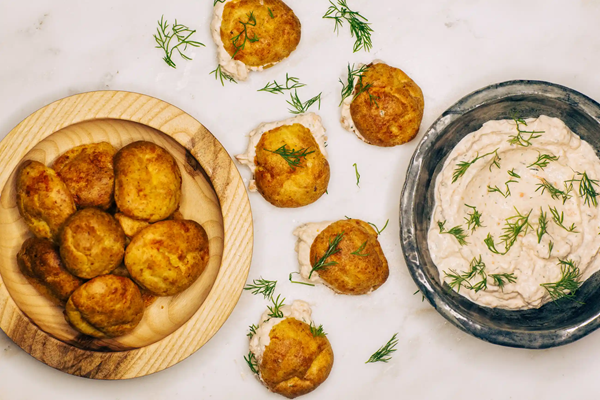 Spelt and cheddar gougeres with salmon trim mousse