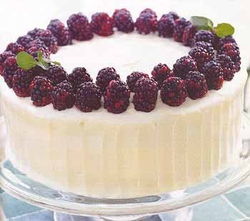 Spice cake with blackberry filling and cream cheese frosting