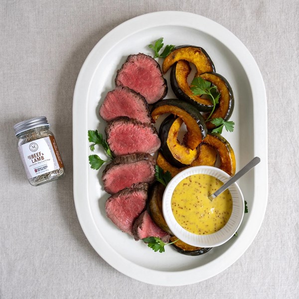 Spice-crusted beef tenderloin with caramelized acorn squash and grainy mustard aioli 