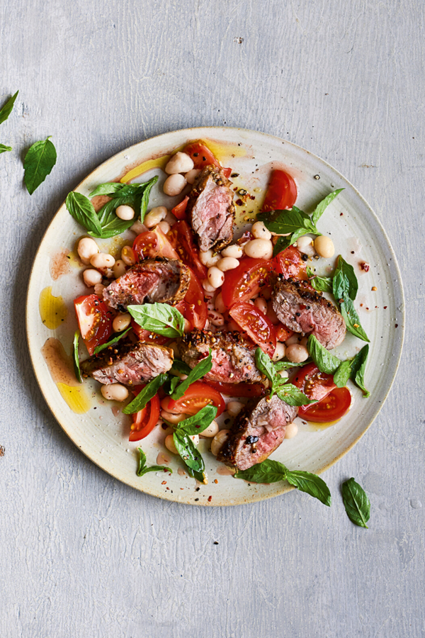 Spice-crusted lamb with white bean & tomato salad