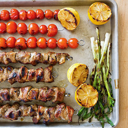Spice-grilled pork skewers with grilled tomato relish