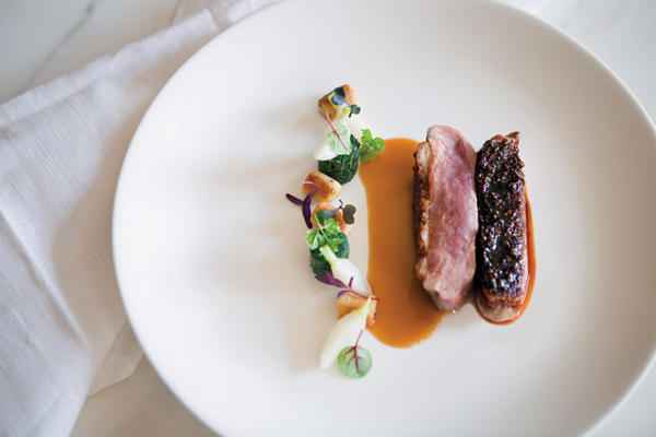 Spice-lacquered duck breasts with baby turnips & turnip greens