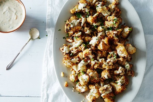 Spice-roasted cauliflower with pine nuts and tahini drizzle