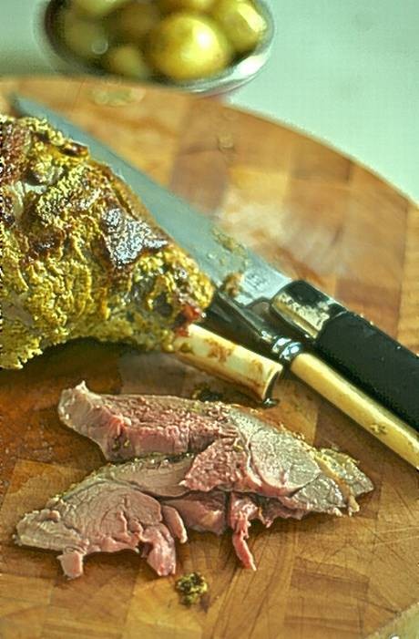 Spice-roasted leg of lamb with cumin potatoes