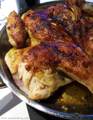 Spice rubbed chicken under a brick with lemon, mint and cilantro
