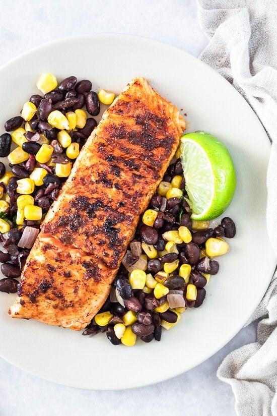 Spice rubbed grilled salmon with black beans corn salsa