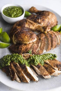 Spice-rubbed roasted chicken with green-herb chutney