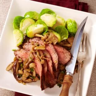 Spice-rubbed steak with sautéed wild mushrooms