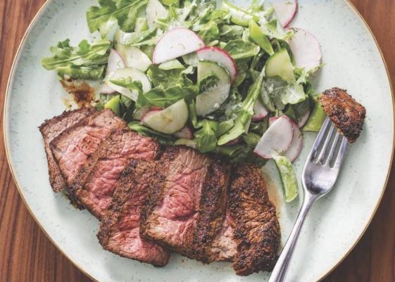 Spice-rubbed steak with snap pea and cucumber salad