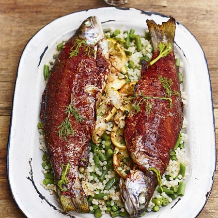 Spice-rubbed trout with giant couscous and green beans