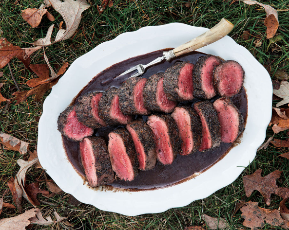 Spice-rubbed venison loin with red wine sauce
