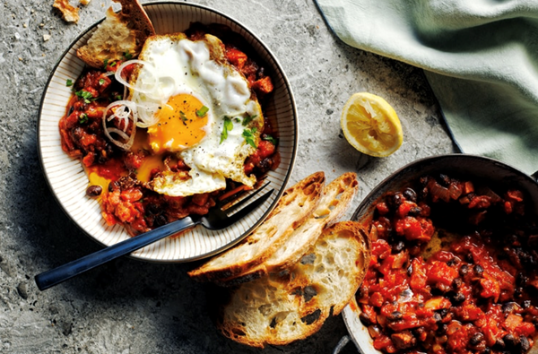 Spiced black beans, chorizo, fried eggs and herbs