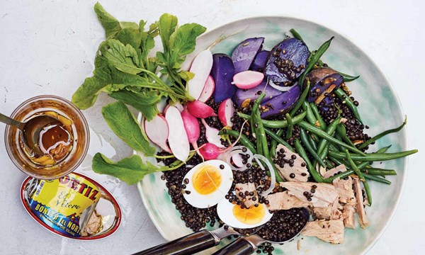Spiced black lentil salad with tuna, radish and purple potatoes