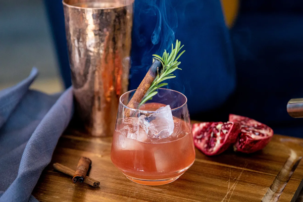 Spiced bourbon cocktail with pomegranate syrup