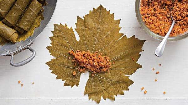 Spiced burghul wrapped in vine leaves (Yaprak sarma)