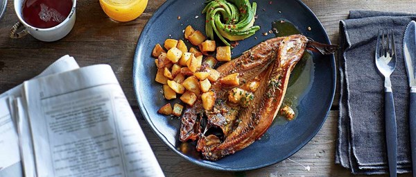 Spiced buttered kippers with crispy potatoes and avocado