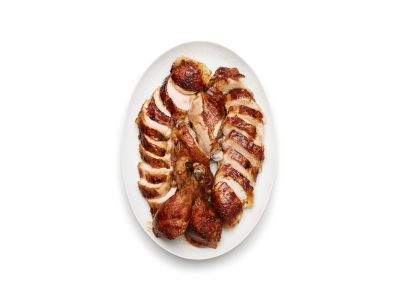 Spiced capon with pomegranate glaze