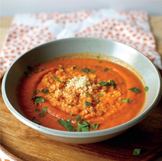 Spiced carrot and pepper soup with a couscous swirl