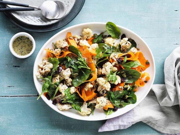 Spiced cauliflower, pumpkin seed and carrot salad with tahini lemon dressing