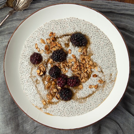 Spiced chia pudding with blackberries and granola