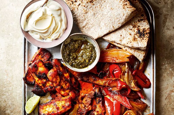 Spiced chicken & halloumi traybake