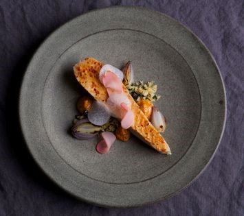Spiced chicken breast with miso mayonnaise, kombu crumb and pickled radishes