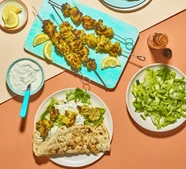 Spiced chicken kebabs with chopped salad & flatbreads