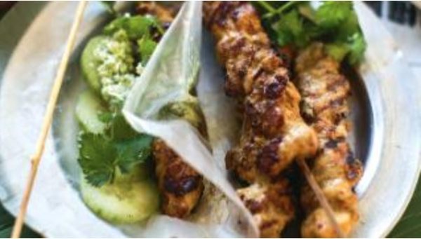 Spiced chicken skewers with coconut chutney and rice wrappers