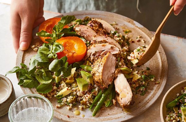 Spiced chicken with warm green herb grains, asparagus, avocado & pistachio