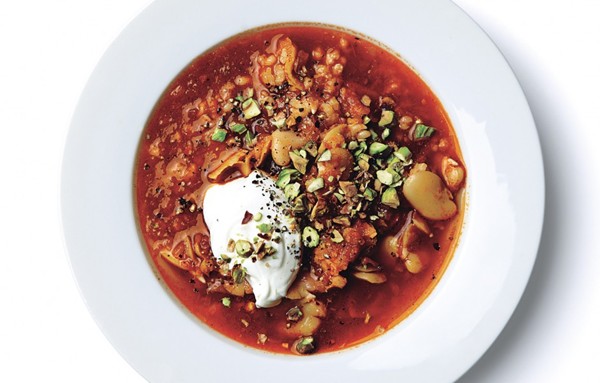 Spiced fava bean soup with rice and tomato