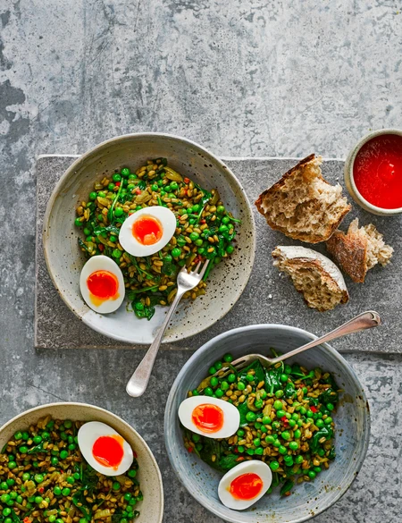 Spiced grains with peas, spinach and jammy eggs