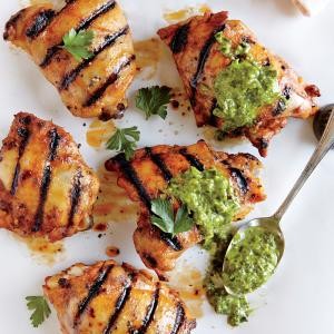 Spiced grilled chicken thighs with creamy chile-herb sauce