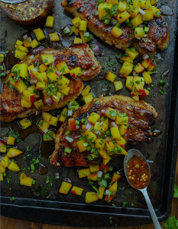 Spiced honey-glazed pork chops with peach salsa
